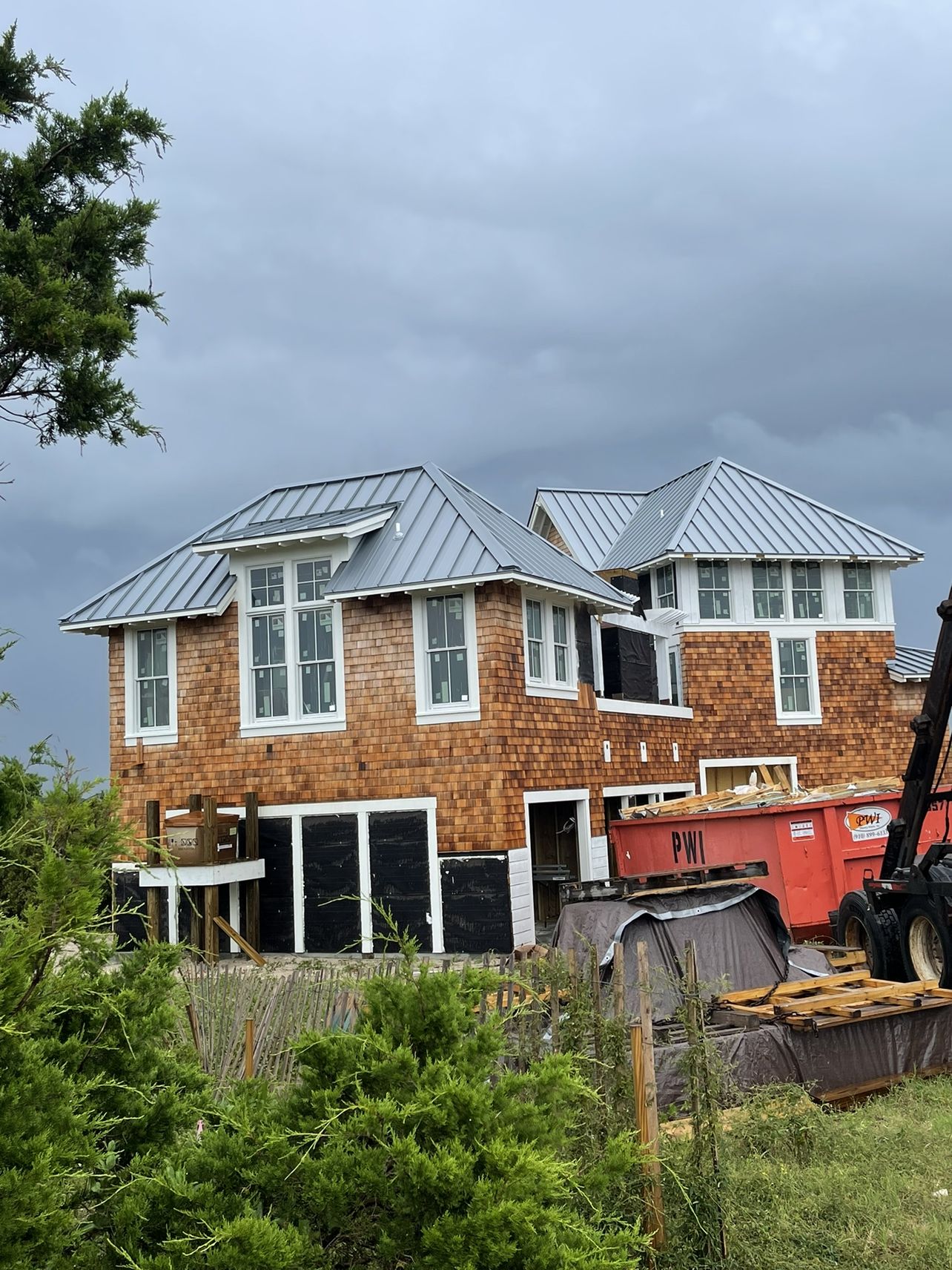 Cedar shake home with new roof installation