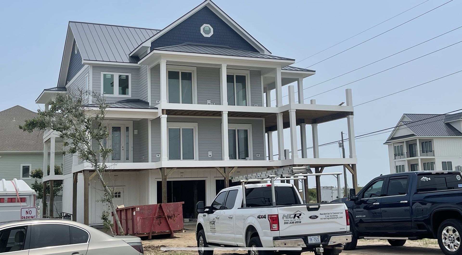 Three-story coastal home roofing project