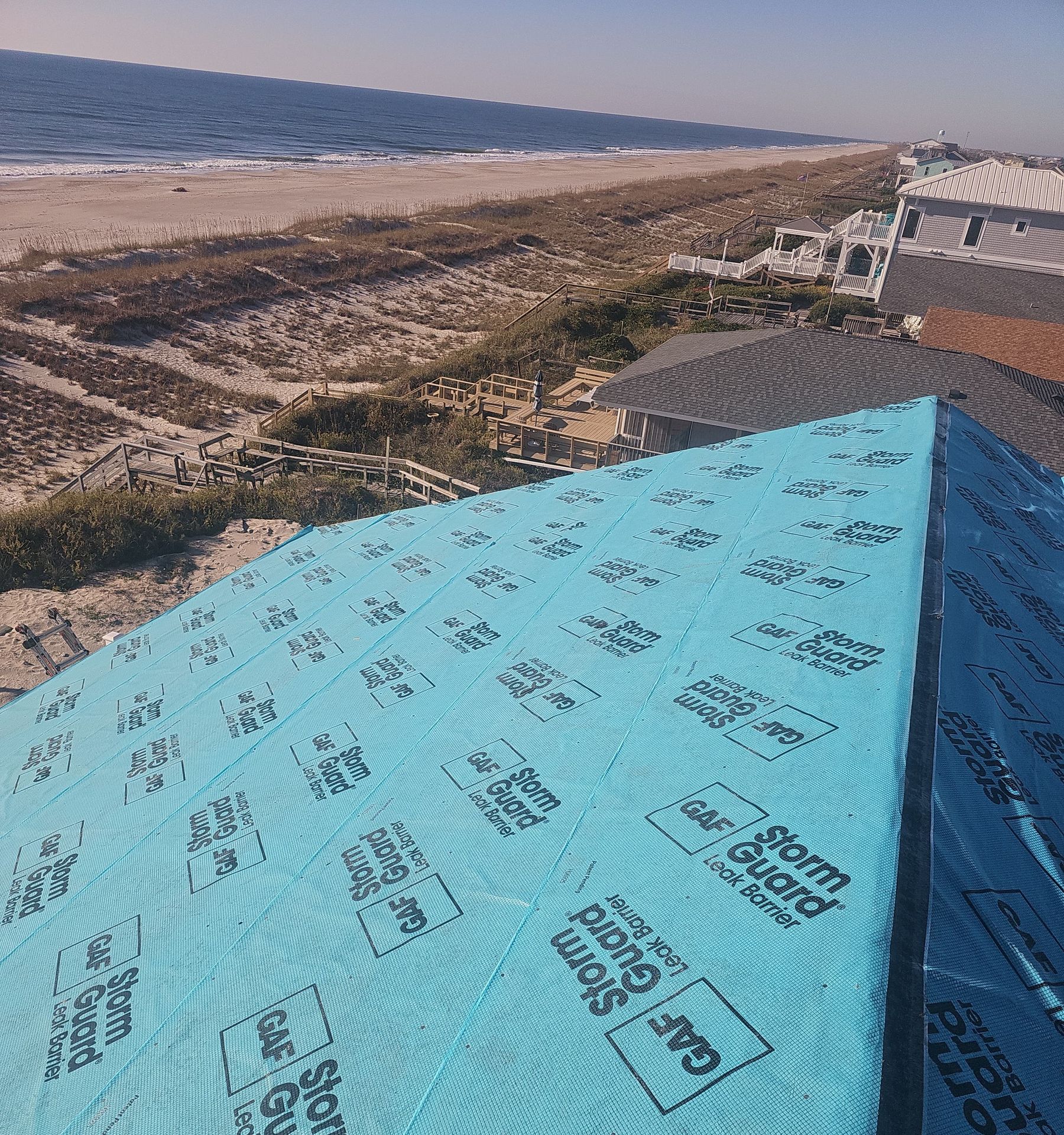 Underlayment installation on oceanfront home